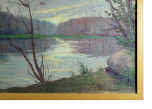 Close-up of the reflections of the sunrise and trees in the water in Louis Blanchard's painting.