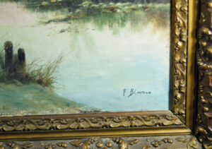 Detail of Francisco Blasco's signature on the sunset landscape painting.