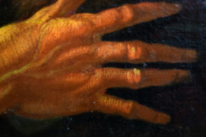 Close-up detail of the saint's fingers in an 18th-century French or Italian school oil painting, showcasing the fine brushwork and texture.